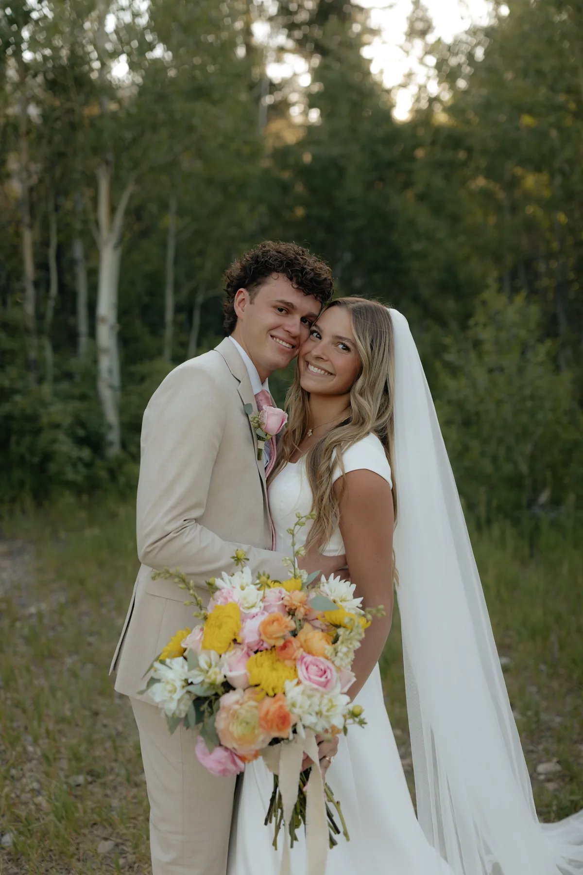 Lot and his wife smiling together on their wedding day.